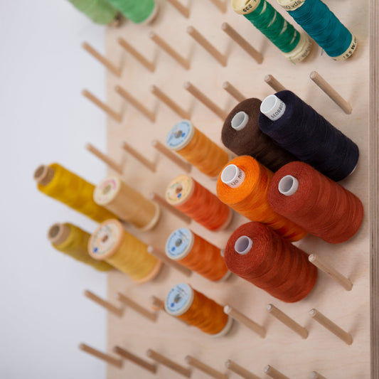 Sewing machine thread storage
