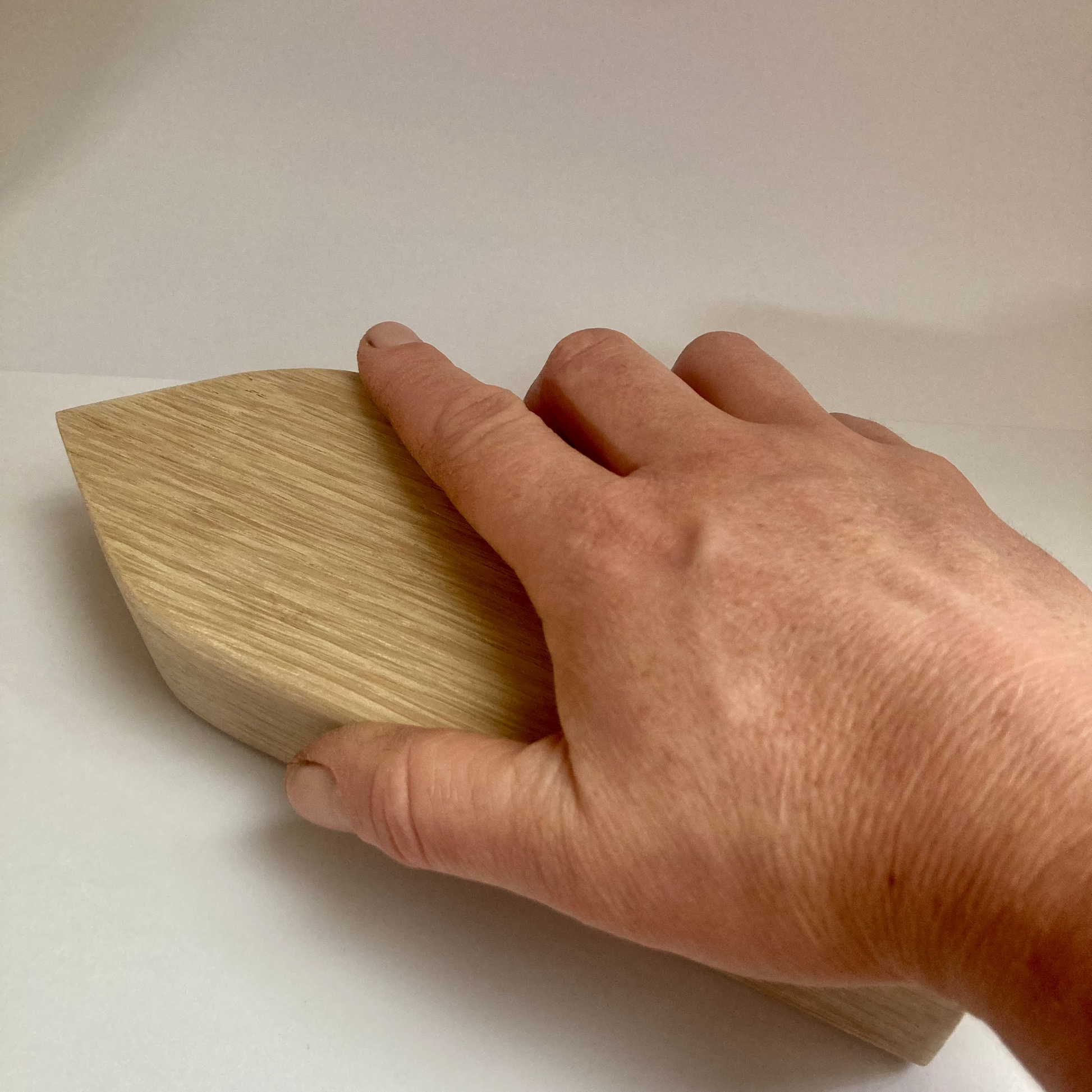Tailor's clapper pressing tool in action