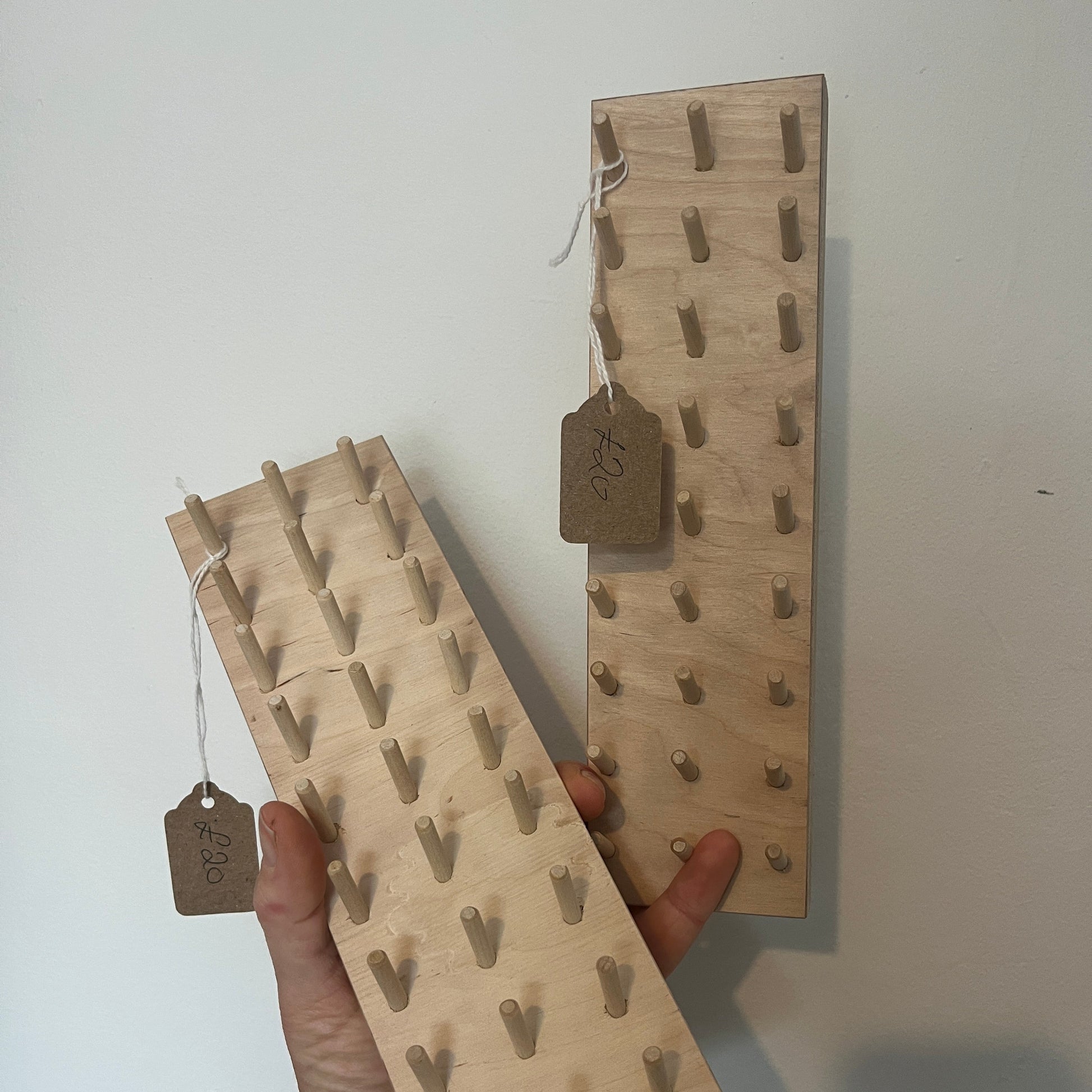 Two obbin holder pegboards