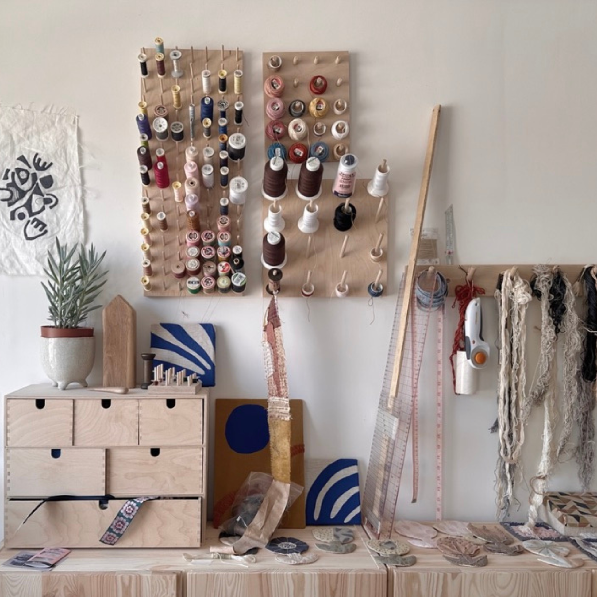 Sewing studio with pegboard storage