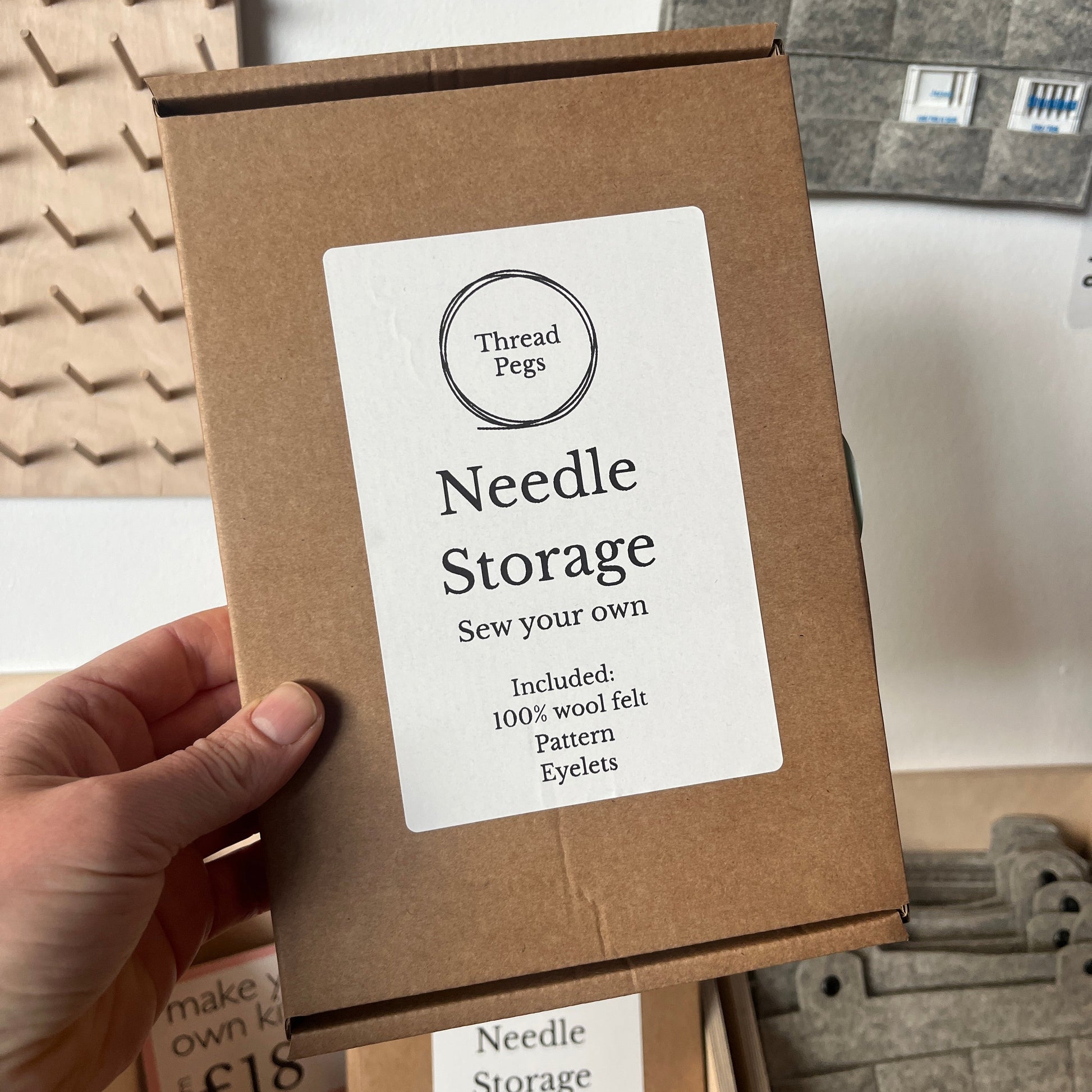 A box containing needle storage organiser