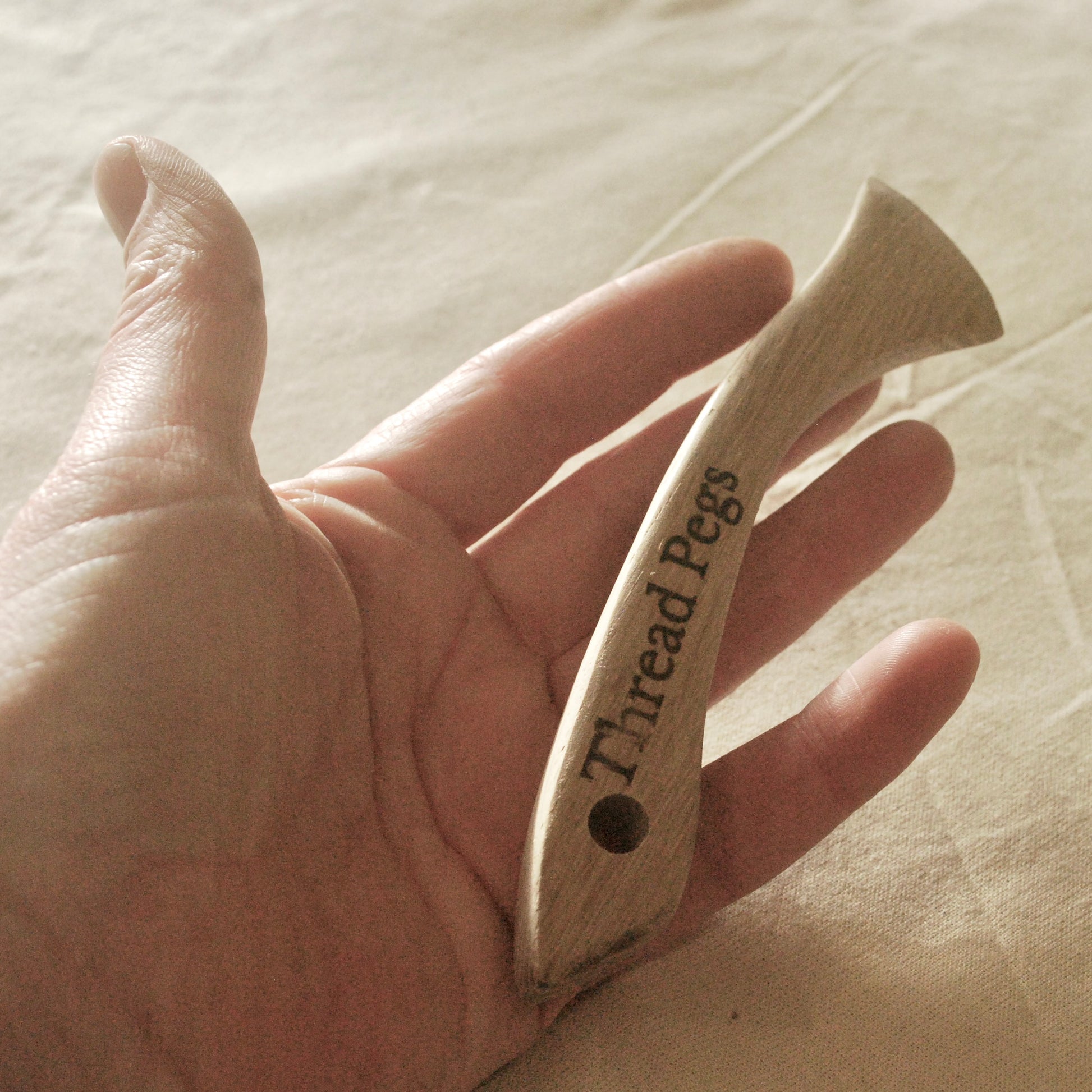 Sewing tool hand made from wood