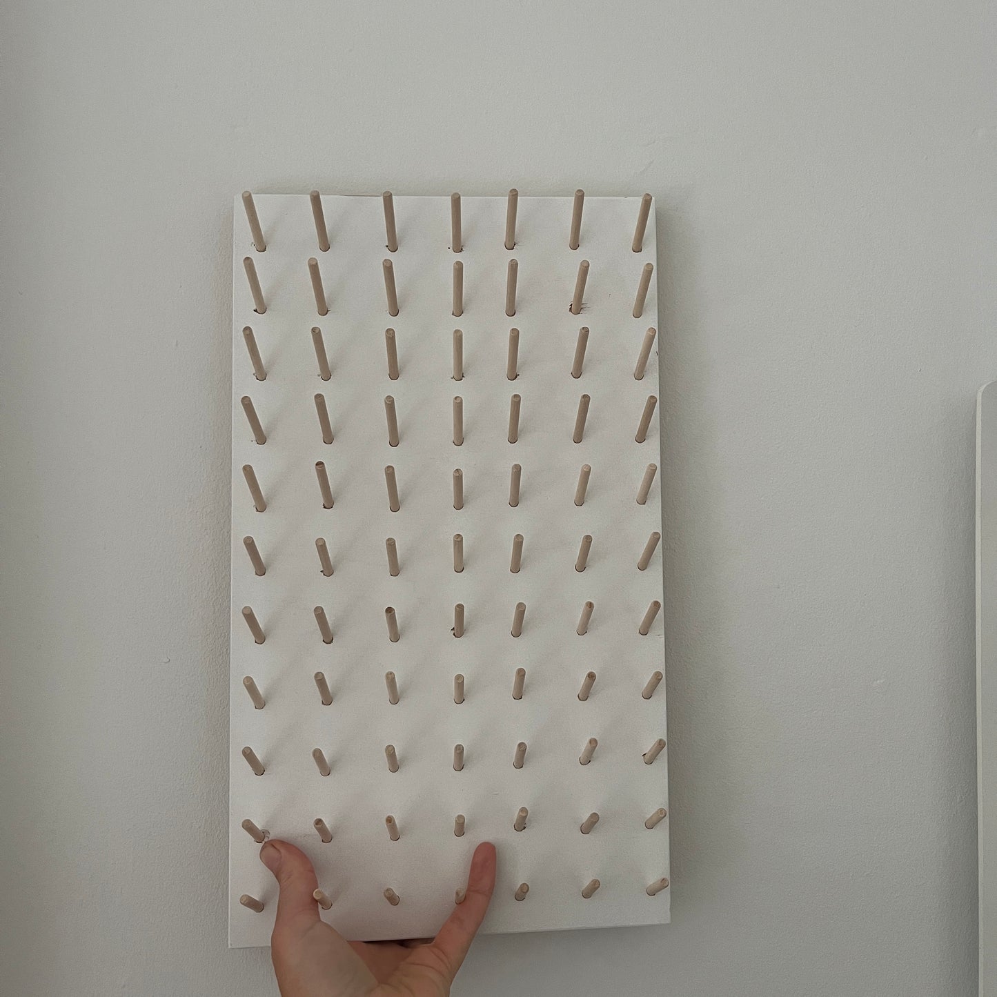 White pegboard for y